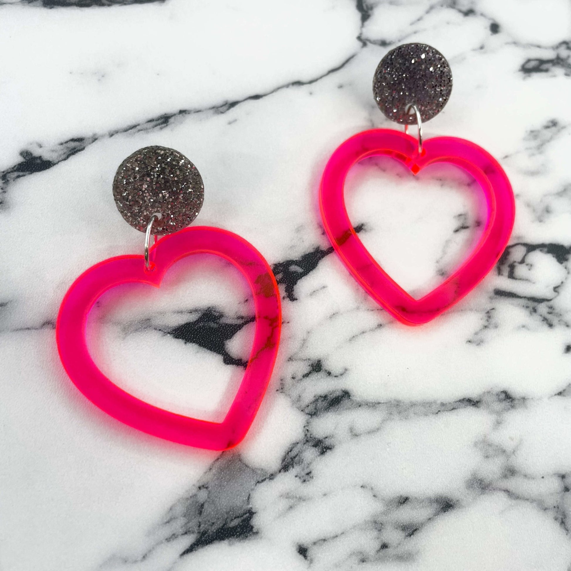 Neon Pink Open Heart Earrings - Lost Minds Clothing
