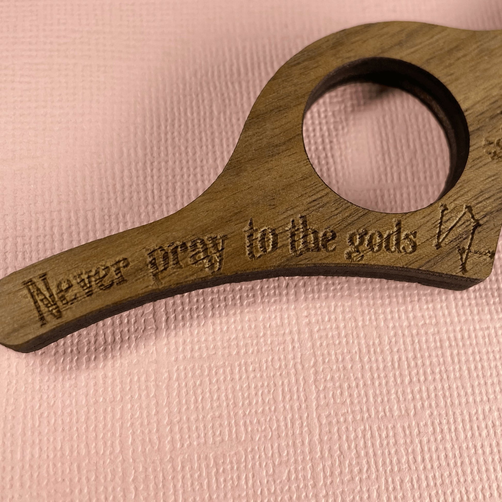 Never Pray To Gods Thumb Book Holder - Lost Minds Clothing