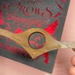 No Mourners, No Funerals Thumb Book Holder - Lost Minds Clothing